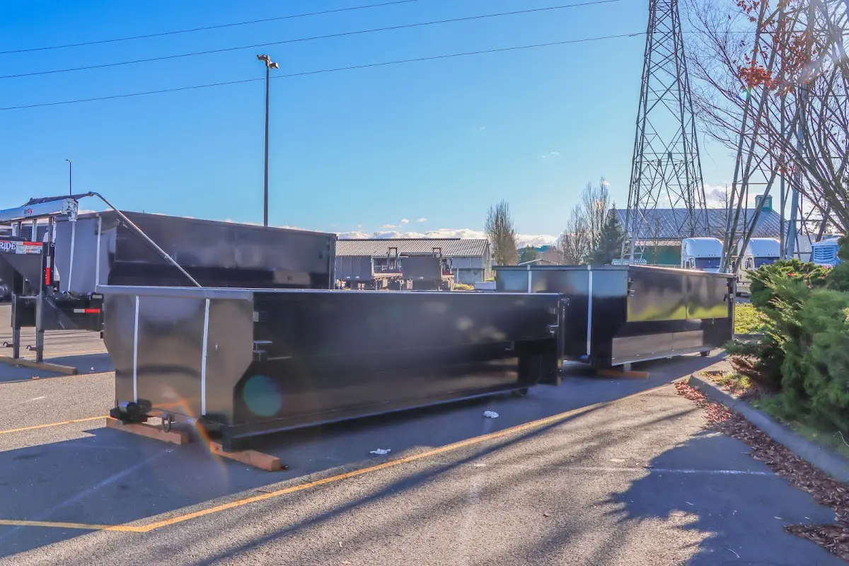 Roll-off dumpster ready for waste disposal at job site for 2 Yard Dumpster Rental in Becker